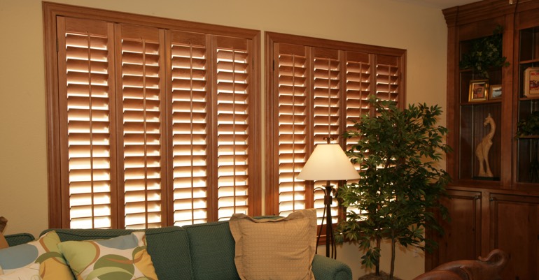 Natural wood shutters in Phoenix living room.